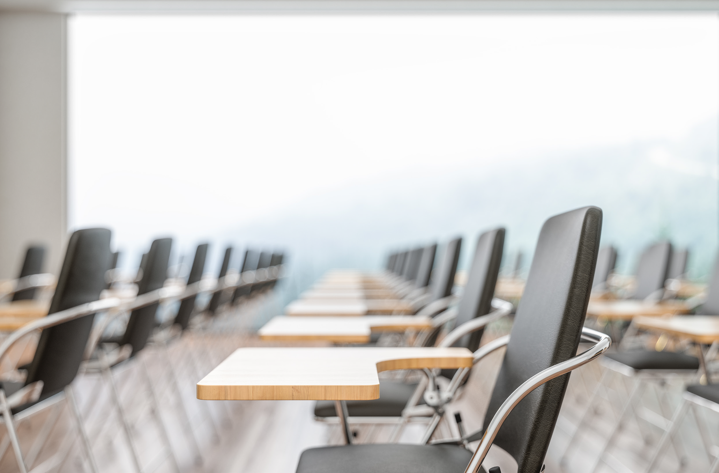 Empty classroom seats and desks